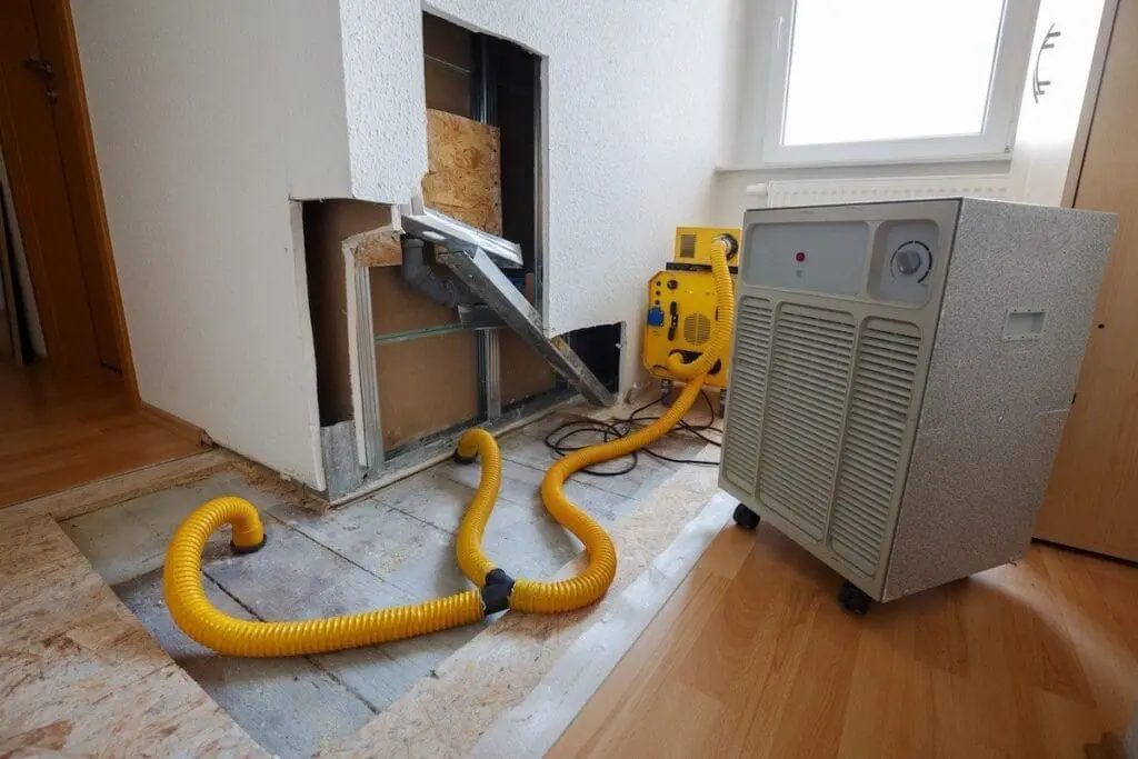 Air movers and dehumidifier set up for structural drying
